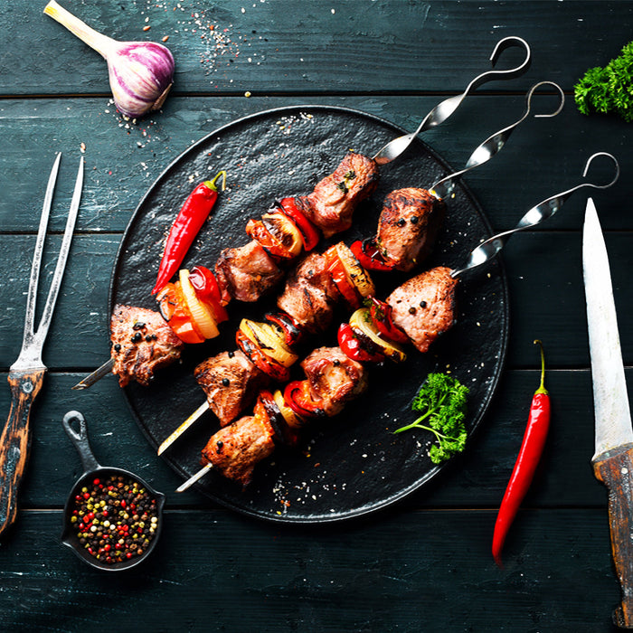 Georgian pork shashlik recipe online by Suneli Valley. Image of pork on skewers